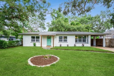 This fully remodeled 2 bedroom, 1.5 bathroom single story home on The Dunedin Country Club in Florida - for sale on GolfHomes.com, golf home, golf lot
