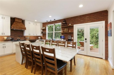 This custom-built home sits on a roundabout cul-de-sac nestled on Hampton Golf Village in Georgia - for sale on GolfHomes.com, golf home, golf lot