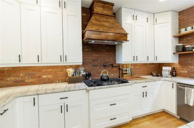 This custom-built home sits on a roundabout cul-de-sac nestled on Hampton Golf Village in Georgia - for sale on GolfHomes.com, golf home, golf lot