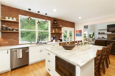 This custom-built home sits on a roundabout cul-de-sac nestled on Hampton Golf Village in Georgia - for sale on GolfHomes.com, golf home, golf lot