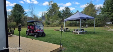 Your Perfect Up North Escape Awaits!  Discover this amazing on Lakeside Golf Course in Michigan - for sale on GolfHomes.com, golf home, golf lot