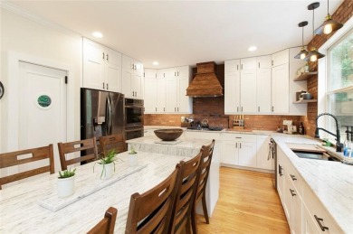 This custom-built home sits on a roundabout cul-de-sac nestled on Hampton Golf Village in Georgia - for sale on GolfHomes.com, golf home, golf lot