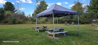 Your Perfect Up North Escape Awaits!  Discover this amazing on Lakeside Golf Course in Michigan - for sale on GolfHomes.com, golf home, golf lot