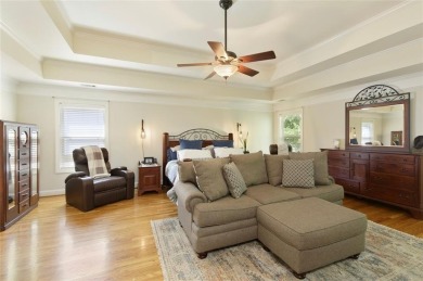 This custom-built home sits on a roundabout cul-de-sac nestled on Hampton Golf Village in Georgia - for sale on GolfHomes.com, golf home, golf lot