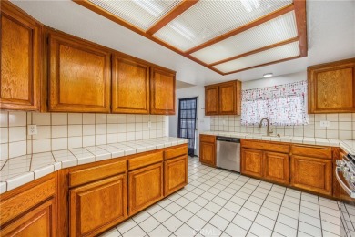 Welcome to 12411 Spring Valley Parkway, located in the highly on Spring Valley Lake Country Club in California - for sale on GolfHomes.com, golf home, golf lot