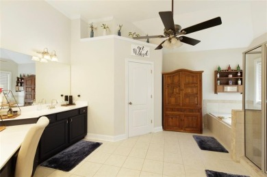This custom-built home sits on a roundabout cul-de-sac nestled on Hampton Golf Village in Georgia - for sale on GolfHomes.com, golf home, golf lot