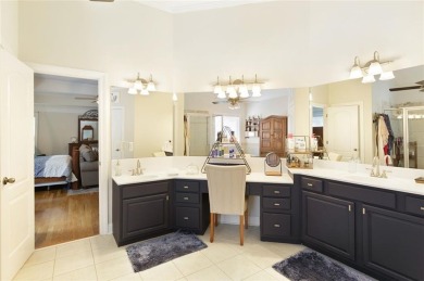 This custom-built home sits on a roundabout cul-de-sac nestled on Hampton Golf Village in Georgia - for sale on GolfHomes.com, golf home, golf lot