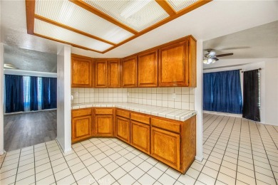 Welcome to 12411 Spring Valley Parkway, located in the highly on Spring Valley Lake Country Club in California - for sale on GolfHomes.com, golf home, golf lot