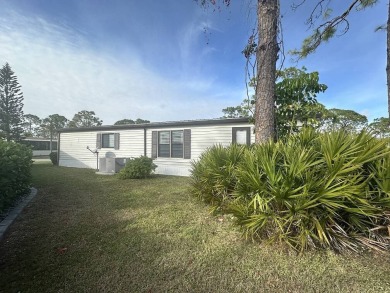 Beautiful 2 bedroom / 2-bathroom cozy home on the 18th tee box! on Lake Fairways Country Club in Florida - for sale on GolfHomes.com, golf home, golf lot
