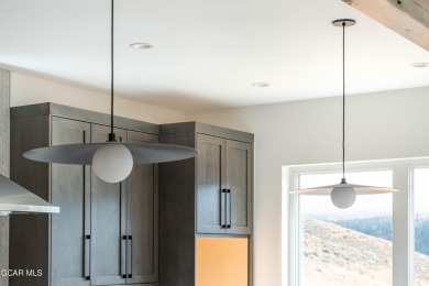 Experience elevated mountain living in this stunning new on Headwaters Golf Course At Granby Ranch in Colorado - for sale on GolfHomes.com, golf home, golf lot