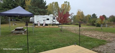 Your Perfect Up North Escape Awaits!  Discover this amazing on Lakeside Golf Course in Michigan - for sale on GolfHomes.com, golf home, golf lot