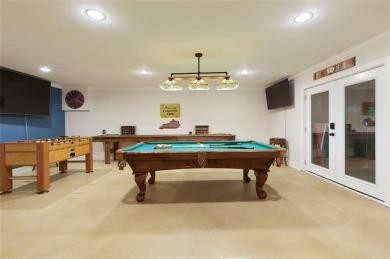 This custom-built home sits on a roundabout cul-de-sac nestled on Hampton Golf Village in Georgia - for sale on GolfHomes.com, golf home, golf lot