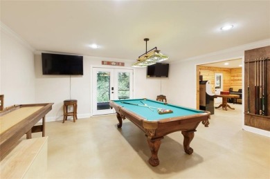 This custom-built home sits on a roundabout cul-de-sac nestled on Hampton Golf Village in Georgia - for sale on GolfHomes.com, golf home, golf lot