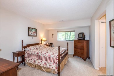 Enjoy the private setting and spacious layout in this 3-bedroom on Farmington Woods Country Club in Connecticut - for sale on GolfHomes.com, golf home, golf lot