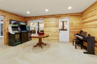 This custom-built home sits on a roundabout cul-de-sac nestled on Hampton Golf Village in Georgia - for sale on GolfHomes.com, golf home, golf lot