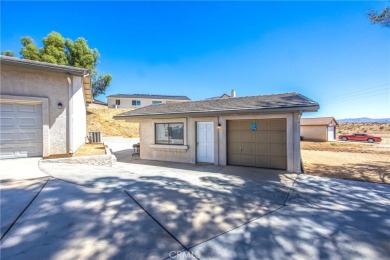 Welcome to 12411 Spring Valley Parkway, located in the highly on Spring Valley Lake Country Club in California - for sale on GolfHomes.com, golf home, golf lot