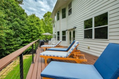 This custom-built home sits on a roundabout cul-de-sac nestled on Hampton Golf Village in Georgia - for sale on GolfHomes.com, golf home, golf lot