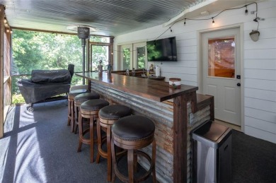 This custom-built home sits on a roundabout cul-de-sac nestled on Hampton Golf Village in Georgia - for sale on GolfHomes.com, golf home, golf lot