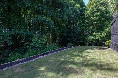 This custom-built home sits on a roundabout cul-de-sac nestled on Hampton Golf Village in Georgia - for sale on GolfHomes.com, golf home, golf lot