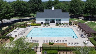 This custom-built home sits on a roundabout cul-de-sac nestled on Hampton Golf Village in Georgia - for sale on GolfHomes.com, golf home, golf lot