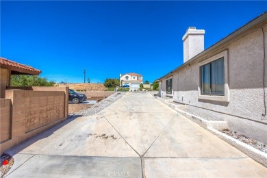 Welcome to 12411 Spring Valley Parkway, located in the highly on Spring Valley Lake Country Club in California - for sale on GolfHomes.com, golf home, golf lot