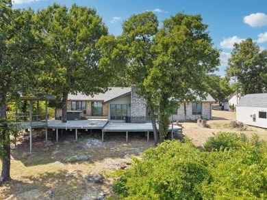 Lovely home with a mountaintop view overlooking Keystone Lake on Keystone Golf Club in Oklahoma - for sale on GolfHomes.com, golf home, golf lot