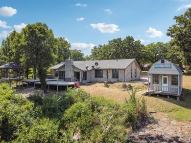 Lovely home with a mountaintop view overlooking Keystone Lake on Keystone Golf Club in Oklahoma - for sale on GolfHomes.com, golf home, golf lot