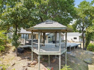 Lovely home with a mountaintop view overlooking Keystone Lake on Keystone Golf Club in Oklahoma - for sale on GolfHomes.com, golf home, golf lot