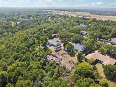 Lovely home with a mountaintop view overlooking Keystone Lake on Keystone Golf Club in Oklahoma - for sale on GolfHomes.com, golf home, golf lot