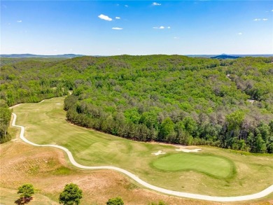 Come experience the ultimate lake lifestyle in this charming on The Highlands Course at Lake Arrowhead in Georgia - for sale on GolfHomes.com, golf home, golf lot