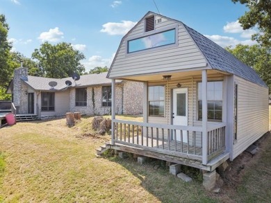 Lovely home with a mountaintop view overlooking Keystone Lake on Keystone Golf Club in Oklahoma - for sale on GolfHomes.com, golf home, golf lot