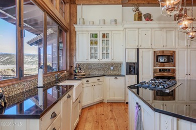 Simply put, this is the pinnacle of Eagle Ranch living. Set on on Eagle Ranch in Colorado - for sale on GolfHomes.com, golf home, golf lot