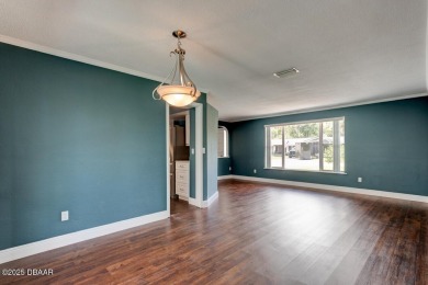 WOW FACTOR is on prominent display throughout this fantastic on Daytona Beach Golf Club in Florida - for sale on GolfHomes.com, golf home, golf lot