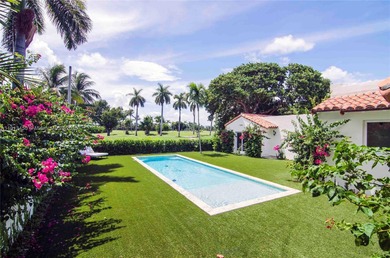 Magnificent mediterranean on private La Gorce Golf Course. Fully on La Gorce Country Club in Florida - for sale on GolfHomes.com, golf home, golf lot