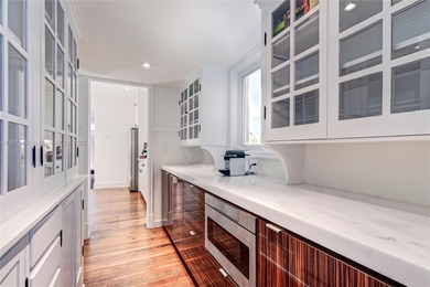 Magnificent mediterranean on private La Gorce Golf Course. Fully on La Gorce Country Club in Florida - for sale on GolfHomes.com, golf home, golf lot