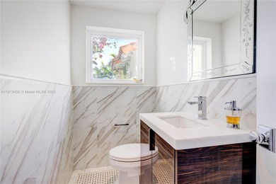 Magnificent mediterranean on private La Gorce Golf Course. Fully on La Gorce Country Club in Florida - for sale on GolfHomes.com, golf home, golf lot