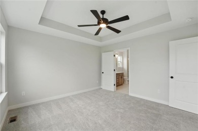 **Live where it feels like you're on vacation every day.** on Golf Club of Creekmoor in Missouri - for sale on GolfHomes.com, golf home, golf lot