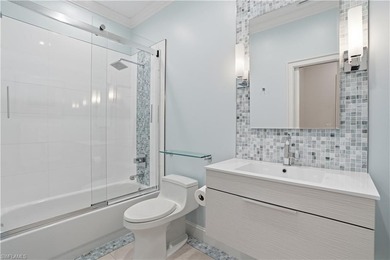 Experience elevated coastal living in this stylish and on Pelican Marsh Golf Club in Florida - for sale on GolfHomes.com, golf home, golf lot