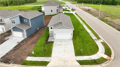 **Live where it feels like you're on vacation every day.** on Golf Club of Creekmoor in Missouri - for sale on GolfHomes.com, golf home, golf lot
