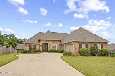 Great curb appeal on this four bedroom three bath home in Lake on Lake Caroline Golf Club in Mississippi - for sale on GolfHomes.com, golf home, golf lot