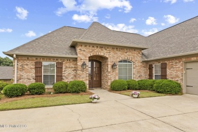 Great curb appeal on this four bedroom three bath home in Lake on Lake Caroline Golf Club in Mississippi - for sale on GolfHomes.com, golf home, golf lot