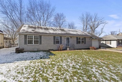 This attractive brick home sits on a quiet neighborhood block in on Lagos Acres Golf Course in Iowa - for sale on GolfHomes.com, golf home, golf lot