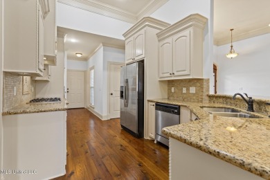 Great curb appeal on this four bedroom three bath home in Lake on Lake Caroline Golf Club in Mississippi - for sale on GolfHomes.com, golf home, golf lot