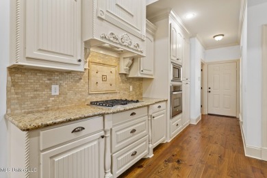 Great curb appeal on this four bedroom three bath home in Lake on Lake Caroline Golf Club in Mississippi - for sale on GolfHomes.com, golf home, golf lot