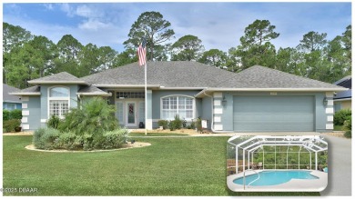 This stunning 4-bedroom saltwater pool home offers both elegance on Plantation Bay Golf and Country Club in Florida - for sale on GolfHomes.com, golf home, golf lot