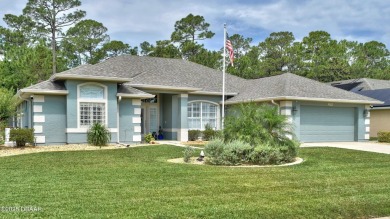 This stunning 4-bedroom saltwater pool home offers both elegance on Plantation Bay Golf and Country Club in Florida - for sale on GolfHomes.com, golf home, golf lot