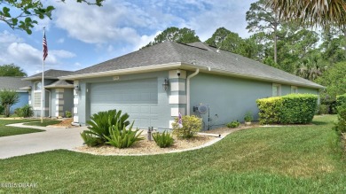 This stunning 4-bedroom saltwater pool home offers both elegance on Plantation Bay Golf and Country Club in Florida - for sale on GolfHomes.com, golf home, golf lot