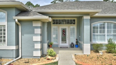 This stunning 4-bedroom saltwater pool home offers both elegance on Plantation Bay Golf and Country Club in Florida - for sale on GolfHomes.com, golf home, golf lot