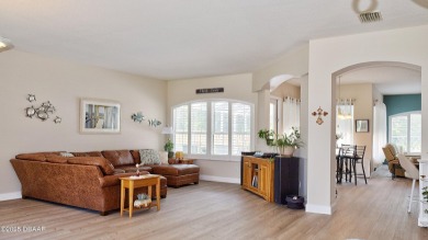 This stunning 4-bedroom saltwater pool home offers both elegance on Plantation Bay Golf and Country Club in Florida - for sale on GolfHomes.com, golf home, golf lot
