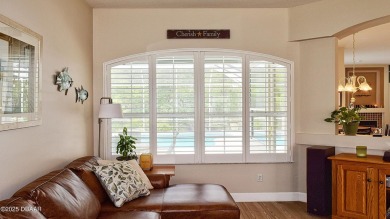 This stunning 4-bedroom saltwater pool home offers both elegance on Plantation Bay Golf and Country Club in Florida - for sale on GolfHomes.com, golf home, golf lot